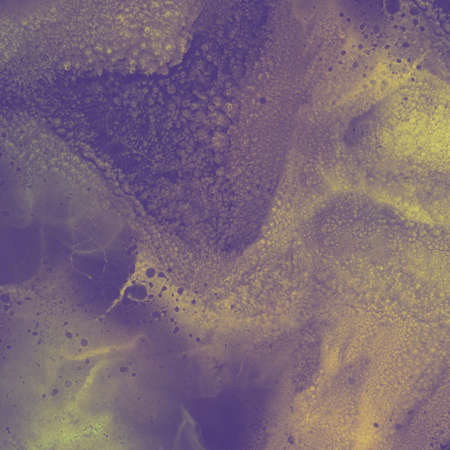 Transparent yellow paint flowing over a square of purple. Ideal eye catching background to be noticed.の写真素材