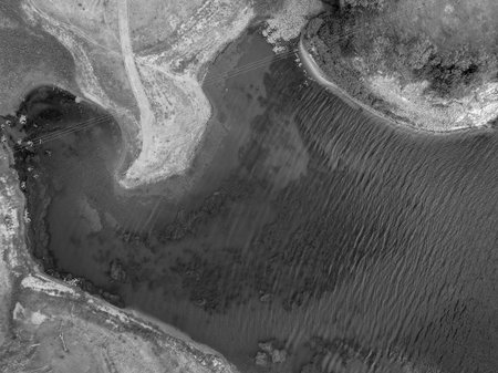 Eungella Dam Queensland Australia with low water levels showing texture in the and pattern in the...
