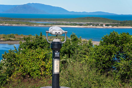 A con in the slot telescope for looking out to sea. On a lookout in Bowen Queensland Australia.の写真素材