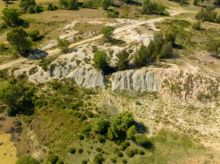 Drone aerial over piles of dirt caused by sapphire mining in central Queensland Australiaの写真素材