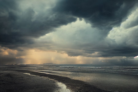 Creative illustration of clouds in the sky. Storm clouds above a lonely beach.の写真素材