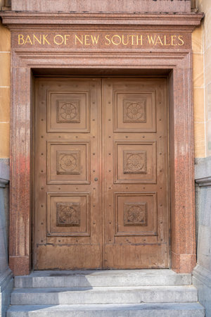 Brisbane, Queensland, Australia - November 2022: The historical entry door to a bank the city mall.のeditorial素材
