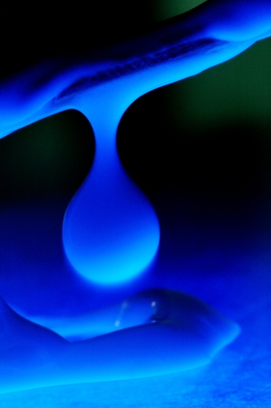 close up of cream chemical blue lightの写真素材
