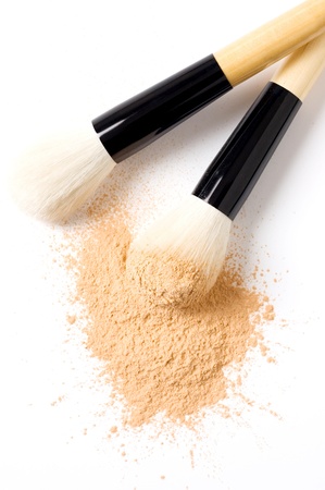 closeup of face powder and brush isolatedの写真素材