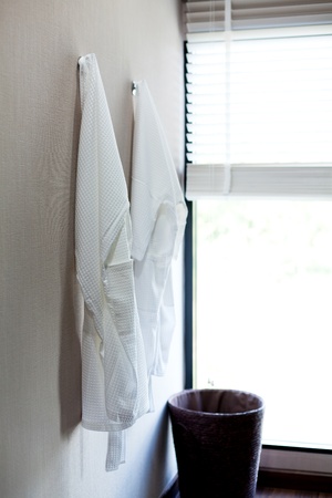 two white bathrobes in bedroomのeditorial素材