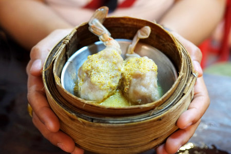 Crab legs dim sum in bamboo steamer bowl, chinese cuisineの写真素材