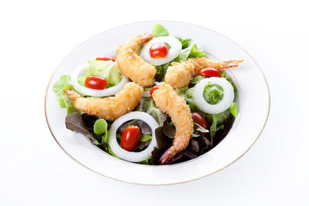 Deep fried shrimp with salad and mayonnaise on dishの写真素材