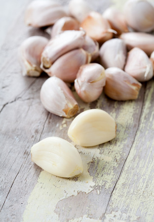 Garlic on wooden backgroundの写真素材