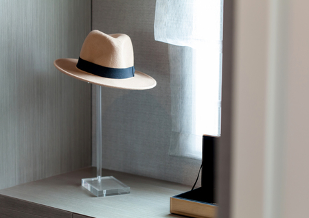 Brown hat with ribbon on dressing table, selective focusの写真素材