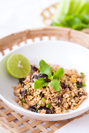 Ground pork salad with fresh vegetable and lemon, Traditional Thai food, selective focusの写真素材
