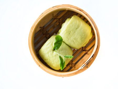 Chinese Steamed Buns on white background, from green teaの写真素材