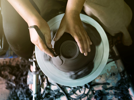 Potter making a clay pot, handmade, selective focusの写真素材