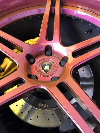 Houston TX, October 14, 2018.  A colorful reflective rim and brake drum from a Lamborghini at the 2018 Lamborghini Festivalのeditorial素材