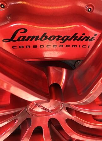 Houston TX, October 14, 2018.  A ruby red rim and brake pad from a Lamborghini at the 2018 Lamborghini Festivalのeditorial素材