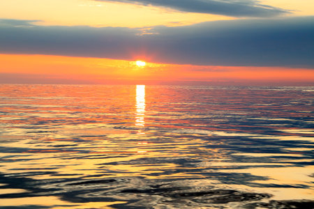 Colorful Sunset over calm ocean water in Floridaの写真素材