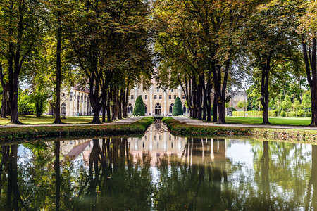 Asnieres-on-Oise, France, August 24th 2017 - Royaumont Abbey, and its superb reflection in the pondのeditorial素材