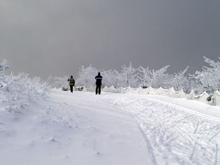 Beautiful winter landscape with peopleの写真素材
