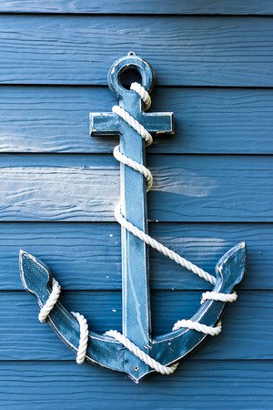 Old blue wooden wall anchorの写真素材