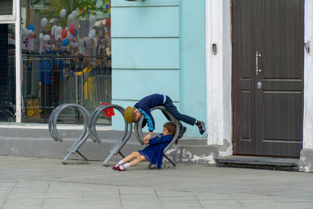 MOSCOW, RUSSIA - MAY 9, 2019: Immortal regiment procession in Victory Day. Two children boy and girl...