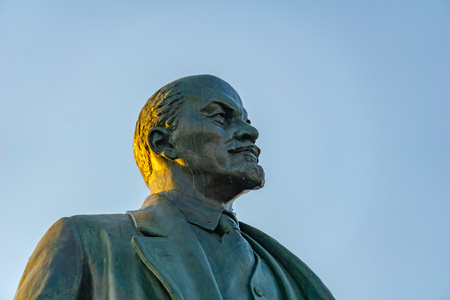 Soviet communist leader Vladimir Lenin statue in front of old building at VDNH in Moscow, Russia on June 2019のeditorial素材