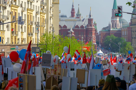 MOSCOW, RUSSIA - MAY 9, 2019: Immortal regiment procession in Victory Day. Thousands of people...