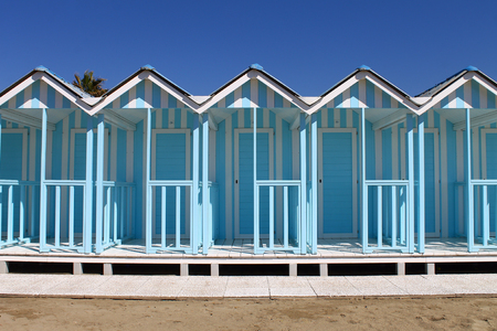 Beach huts on blue Forte dei Marmiの写真素材
