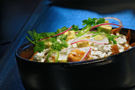 Chilaquiles with dark backgroundの写真素材