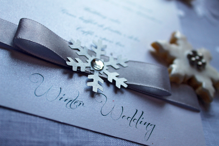 Winter Wedding text with ribbon and metal snowflakeの写真素材