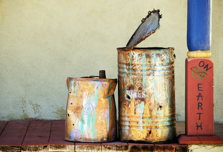 Painted metal cans on a porch in Cottonwood, Arizona.の写真素材