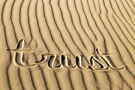 Trust Written in the Rippled Sand at Great Sand Dunes National Park and Preserve, Coloradoの写真素材