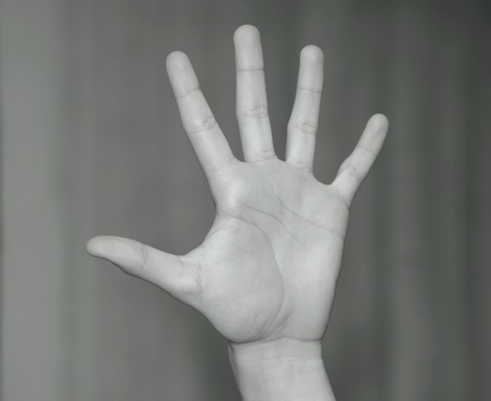 Hand stretching black and whiteの写真素材
