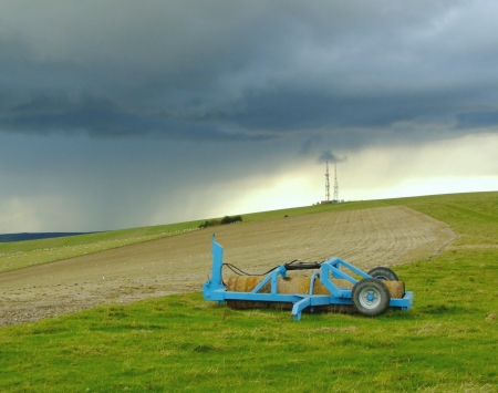Farm machinery in fieldsの写真素材