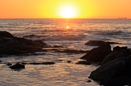Sunrise over the ocean at Shelley Point in the West Coast of the Western Cape, South Africaの写真素材