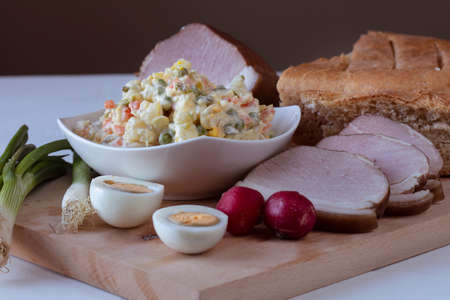 Traditional croatian Easter dish: Oliviers salad with cooked smoked ham, radish, horsheradish, eggs and young onion. 
Part od meal   are blessed in church on the day of Easter and are eaten for Easter breakfast.の写真素材