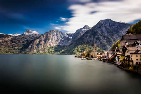 Hallstatt is a village on Lake Hallstatt's western shore in Austria's mountainous Salzkammergut regionの写真素材