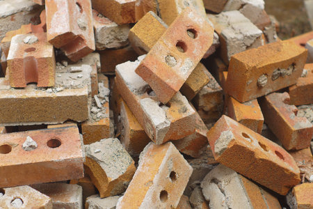 Heaps of many red bricks demolition masonry
