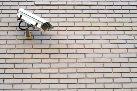 protection security camera outdoor building brick wall