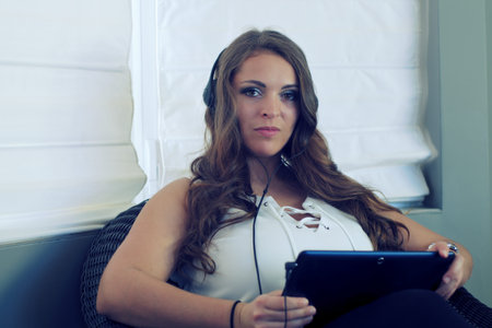 smiling young women listen music headphone lady holding player