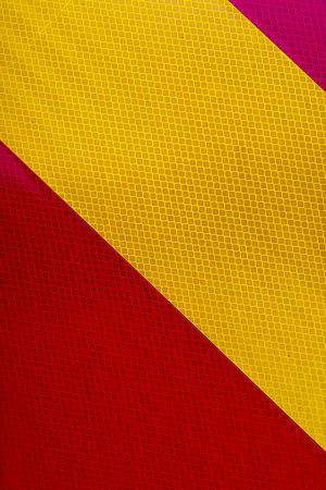yellow and red security striped panel warning dangerの写真素材