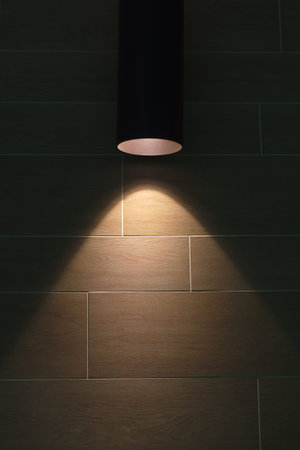 spot light on tile wall background lamp projection