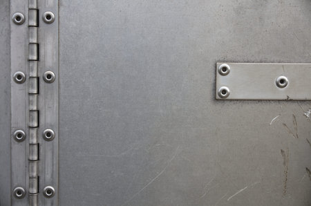 heavy metal rivet stainless steel hinge door plate background