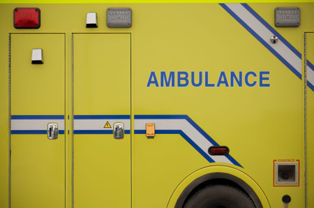 Vibrant yellow ambulance graphic symbolizing urgent medical care and rescue services for...