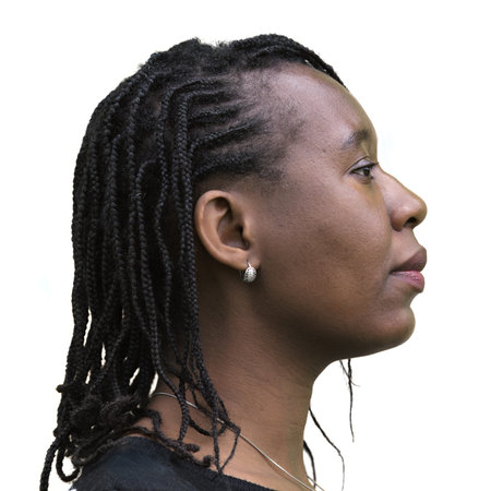 Side profile portrait of an African woman with braided hair against a white background. Perfect for...