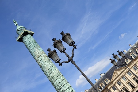 Column, buildings and lamp Place Vendome in Parisの写真素材