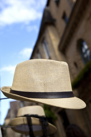 Straw hat for man in a outdoor marketの写真素材