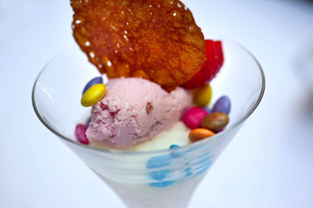 Raspberry ice cream and vanilla, candy and biscuit
