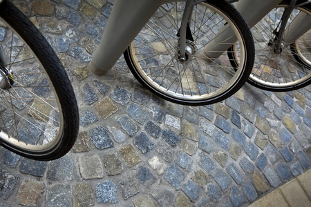Bikes on a parking in townの写真素材