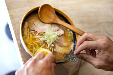 Chef cooking a japanese soupの写真素材