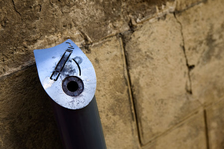 Dirty ashtray on a wallの写真素材