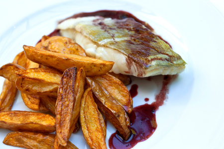 Piece of cod and French fries